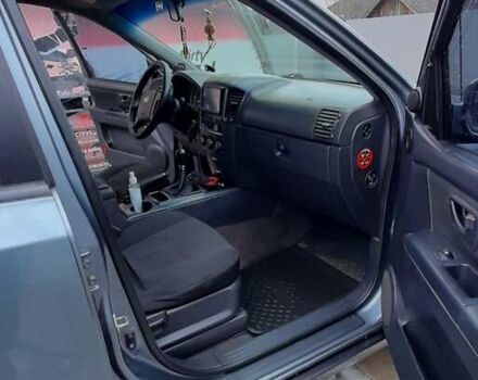 Синий Киа Соренто, объемом двигателя 2.5 л и пробегом 230 тыс. км за 9200 $, фото 1 на Automoto.ua