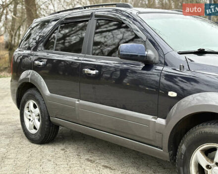 Синий Киа Соренто, объемом двигателя 2.5 л и пробегом 250 тыс. км за 8350 $, фото 10 на Automoto.ua