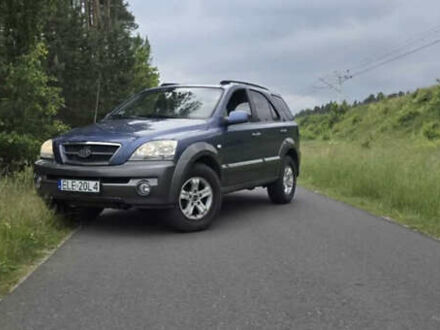 Синий Киа Соренто, объемом двигателя 2.5 л и пробегом 177 тыс. км за 3850 $, фото 1 на Automoto.ua