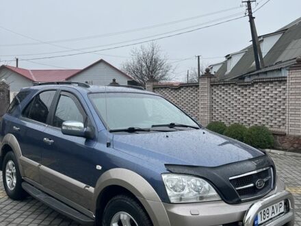 Синий Киа Соренто, объемом двигателя 2.5 л и пробегом 220 тыс. км за 4800 $, фото 1 на Automoto.ua