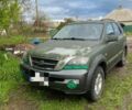 Зеленый Киа Соренто, объемом двигателя 2.5 л и пробегом 280 тыс. км за 1909 $, фото 1 на Automoto.ua