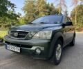 Зелений Кіа Соренто, об'ємом двигуна 2.4 л та пробігом 274 тис. км за 3999 $, фото 1 на Automoto.ua