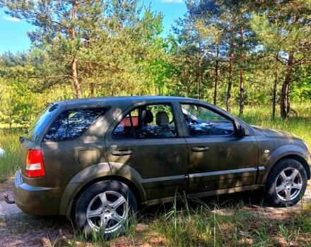 Зеленый Киа Соренто, объемом двигателя 2.5 л и пробегом 297 тыс. км за 5750 $, фото 1 на Automoto.ua