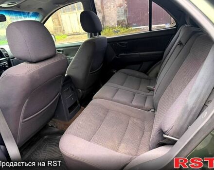 Зеленый Киа Соренто, объемом двигателя 2.5 л и пробегом 256 тыс. км за 3400 $, фото 6 на Automoto.ua