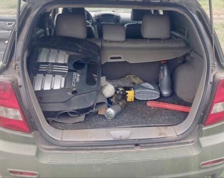 Зеленый Киа Соренто, объемом двигателя 2.5 л и пробегом 260 тыс. км за 3689 $, фото 4 на Automoto.ua