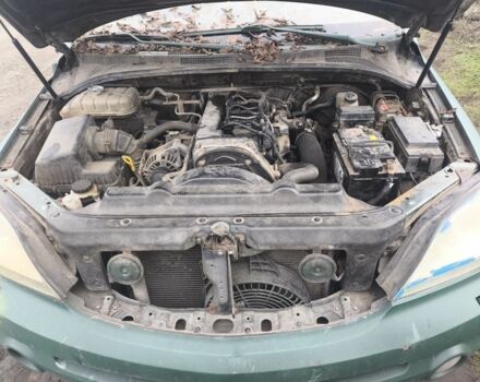 Зеленый Киа Соренто, объемом двигателя 2.5 л и пробегом 255 тыс. км за 1500 $, фото 3 на Automoto.ua