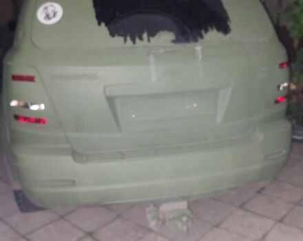 Зеленый Киа Соренто, объемом двигателя 2 л и пробегом 300 тыс. км за 2200 $, фото 3 на Automoto.ua