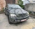 Зеленый Киа Соренто, объемом двигателя 2.5 л и пробегом 300 тыс. км за 1813 $, фото 1 на Automoto.ua