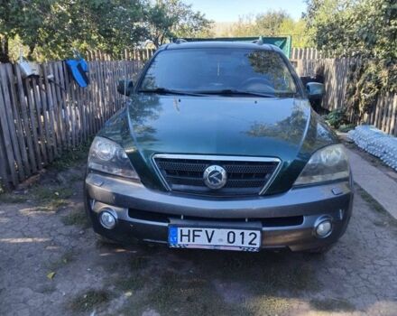 Зеленый Киа Соренто, объемом двигателя 2.5 л и пробегом 286 тыс. км за 4300 $, фото 1 на Automoto.ua