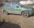 Зеленый Киа Соренто, объемом двигателя 2.5 л и пробегом 265 тыс. км за 4300 $, фото 1 на Automoto.ua