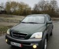 Зеленый Киа Соренто, объемом двигателя 2.5 л и пробегом 250 тыс. км за 3999 $, фото 1 на Automoto.ua