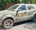 Зеленый Киа Соренто, объемом двигателя 2.5 л и пробегом 365 тыс. км за 4500 $, фото 1 на Automoto.ua