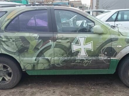 Зеленый Киа Соренто, объемом двигателя 2.5 л и пробегом 300 тыс. км за 1500 $, фото 1 на Automoto.ua