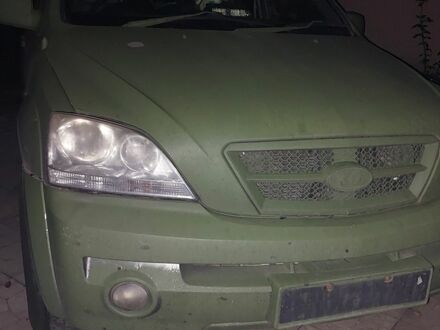 Зеленый Киа Соренто, объемом двигателя 2 л и пробегом 300 тыс. км за 2200 $, фото 1 на Automoto.ua