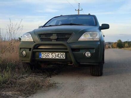Зеленый Киа Соренто, объемом двигателя 2.5 л и пробегом 280 тыс. км за 4300 $, фото 1 на Automoto.ua