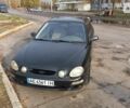 Черный Киа Спектра, объемом двигателя 1.5 л и пробегом 150 тыс. км за 3200 $, фото 1 на Automoto.ua