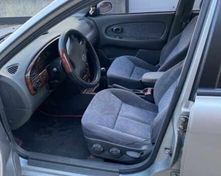 Серый Киа Спектра, объемом двигателя 1.6 л и пробегом 250 тыс. км за 2700 $, фото 5 на Automoto.ua