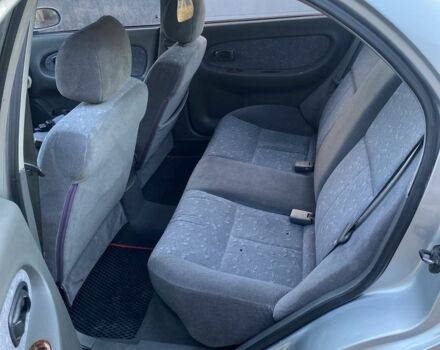 Серый Киа Спектра, объемом двигателя 1.6 л и пробегом 250 тыс. км за 2700 $, фото 4 на Automoto.ua