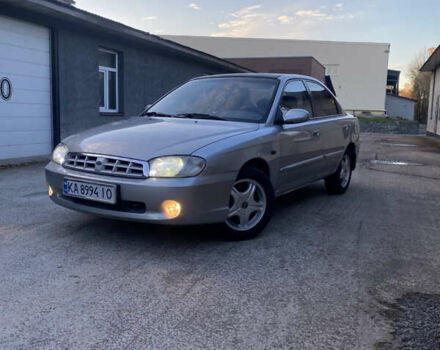 Серый Киа Спектра, объемом двигателя 1.6 л и пробегом 252 тыс. км за 2700 $, фото 1 на Automoto.ua