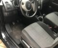 Черный Киа Венга, объемом двигателя 1.4 л и пробегом 150 тыс. км за 7500 $, фото 4 на Automoto.ua