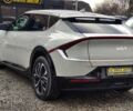 Серый Киа EV6, объемом двигателя 77 л и пробегом 64 тыс. км за 32999 $, фото 3 на Automoto.ua