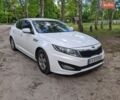 Белый Киа K5, объемом двигателя 2 л и пробегом 425 тыс. км за 6900 $, фото 1 на Automoto.ua