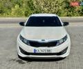 Белый Киа K5, объемом двигателя 2 л и пробегом 255 тыс. км за 9000 $, фото 18 на Automoto.ua