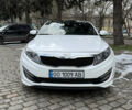 Белый Киа K5, объемом двигателя 2 л и пробегом 226 тыс. км за 9500 $, фото 1 на Automoto.ua