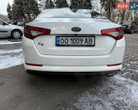 Белый Киа K5, объемом двигателя 2 л и пробегом 226 тыс. км за 9000 $, фото 13 на Automoto.ua