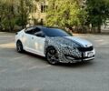 Белый Киа K5, объемом двигателя 2 л и пробегом 280 тыс. км за 8600 $, фото 1 на Automoto.ua