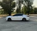 Белый Киа K5, объемом двигателя 2 л и пробегом 280 тыс. км за 8600 $, фото 1 на Automoto.ua