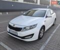 Белый Киа K5, объемом двигателя 2 л и пробегом 425 тыс. км за 7500 $, фото 1 на Automoto.ua