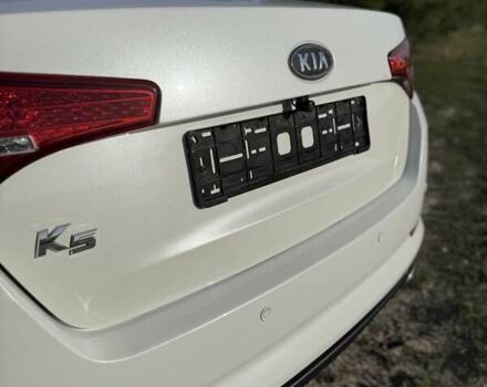 Белый Киа K5, объемом двигателя 2 л и пробегом 240 тыс. км за 8500 $, фото 13 на Automoto.ua