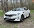 Белый Киа K5, объемом двигателя 2 л и пробегом 322 тыс. км за 9780 $, фото 1 на Automoto.ua