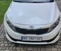 Белый Киа K5, объемом двигателя 2 л и пробегом 255 тыс. км за 10300 $, фото 1 на Automoto.ua
