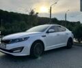 Белый Киа K5, объемом двигателя 2 л и пробегом 272 тыс. км за 9500 $, фото 1 на Automoto.ua
