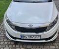 Білий Кіа K5, об'ємом двигуна 2 л та пробігом 255 тис. км за 10300 $, фото 1 на Automoto.ua