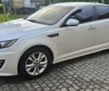 Белый Киа K5, объемом двигателя 2 л и пробегом 255 тыс. км за 10300 $, фото 1 на Automoto.ua