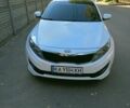 Белый Киа K5, объемом двигателя 2 л и пробегом 216 тыс. км за 9500 $, фото 1 на Automoto.ua