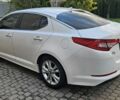 Белый Киа K5, объемом двигателя 2 л и пробегом 255 тыс. км за 10300 $, фото 2 на Automoto.ua