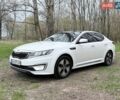 Белый Киа K5, объемом двигателя 2 л и пробегом 322 тыс. км за 9780 $, фото 1 на Automoto.ua