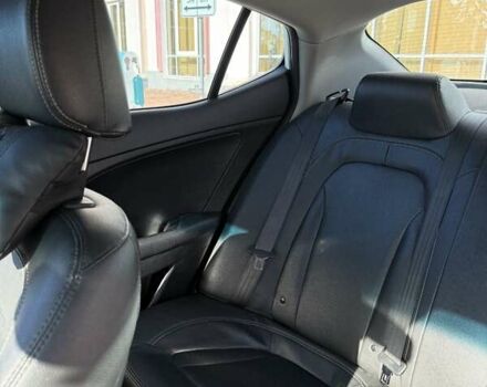 Белый Киа K5, объемом двигателя 2 л и пробегом 98 тыс. км за 9000 $, фото 14 на Automoto.ua