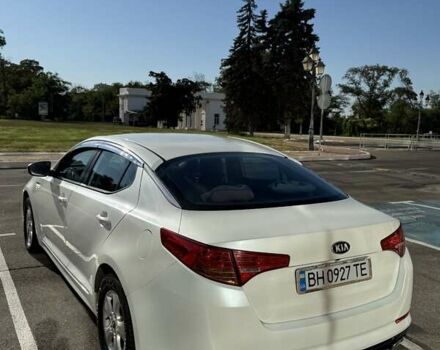 Белый Киа K5, объемом двигателя 2 л и пробегом 98 тыс. км за 9000 $, фото 1 на Automoto.ua