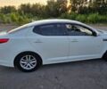 Белый Киа K5, объемом двигателя 2 л и пробегом 305 тыс. км за 6800 $, фото 1 на Automoto.ua