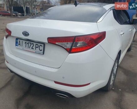 Белый Киа K5, объемом двигателя 2 л и пробегом 216 тыс. км за 10000 $, фото 4 на Automoto.ua