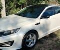 Белый Киа K5, объемом двигателя 2 л и пробегом 349 тыс. км за 8200 $, фото 1 на Automoto.ua