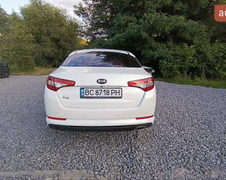 Белый Киа K5, объемом двигателя 2 л и пробегом 209 тыс. км за 10200 $, фото 5 на Automoto.ua