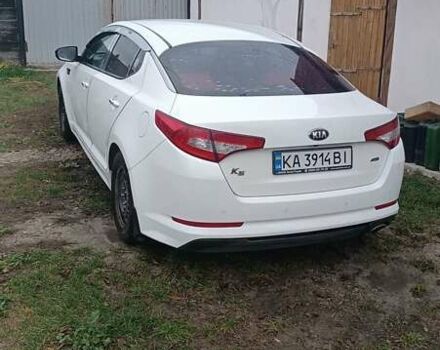 Белый Киа K5, объемом двигателя 2 л и пробегом 230 тыс. км за 10200 $, фото 1 на Automoto.ua