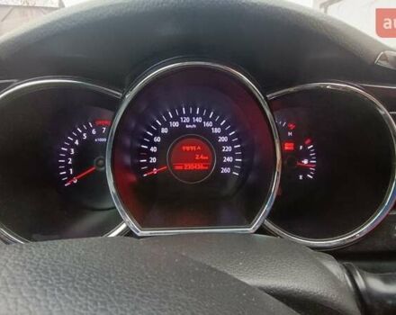 Белый Киа K5, объемом двигателя 2 л и пробегом 230 тыс. км за 10200 $, фото 4 на Automoto.ua