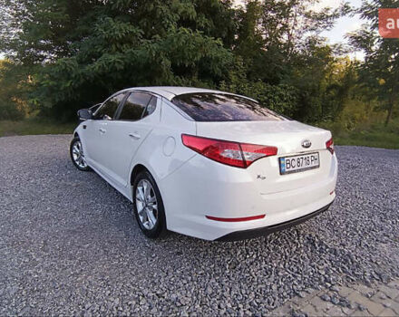 Белый Киа K5, объемом двигателя 2 л и пробегом 209 тыс. км за 10200 $, фото 6 на Automoto.ua
